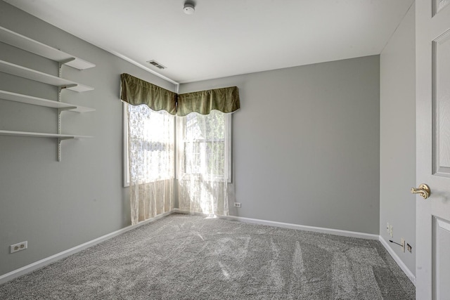 13 Willow Pkwy, Buffalo Grove, IL 60089 - spare room featuring carpet and a smoke detector