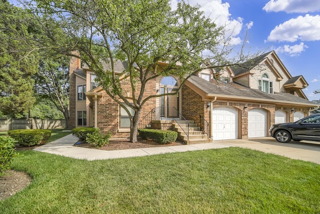 13 Willow Pkwy, Buffalo Grove, IL 60089 - view of front of home featuring brick siding, an attached garage, concrete driveway, and a chimney