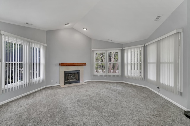 13 Willow Pkwy, Buffalo Grove, IL 60089 - unfurnished living room with vaulted ceiling, carpet flooring, and a fireplace