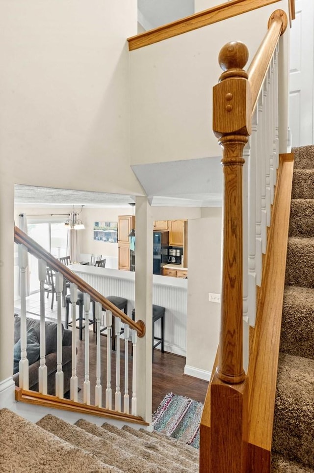 1201 Riviera Dr, Bloomington, IL 61701 - stairs featuring wood finished floors and baseboards