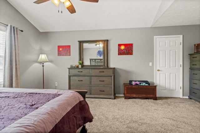 1201 Riviera Dr, Bloomington, IL 61701 - carpeted bedroom with lofted ceiling and ceiling fan