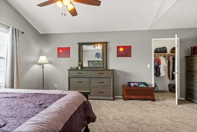 1201 Riviera Dr, Bloomington, IL 61701 - bedroom featuring vaulted ceiling, light colored carpet, a spacious closet, a ceiling fan, and a closet