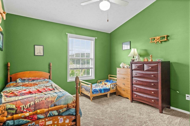 1201 Riviera Dr, Bloomington, IL 61701 - carpeted bedroom with lofted ceiling and ceiling fan