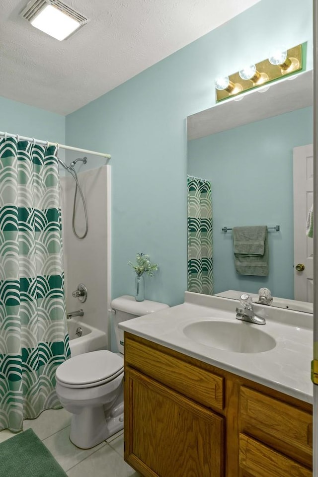 1201 Riviera Dr, Bloomington, IL 61701 - full bathroom featuring vanity, tile patterned flooring, shower / tub combo with curtain, and a textured ceiling