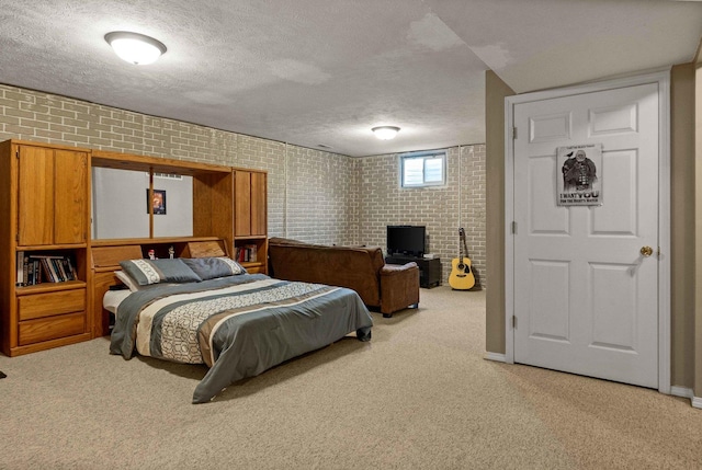 1201 Riviera Dr, Bloomington, IL 61701 - bedroom with carpet flooring, brick wall, and a textured ceiling
