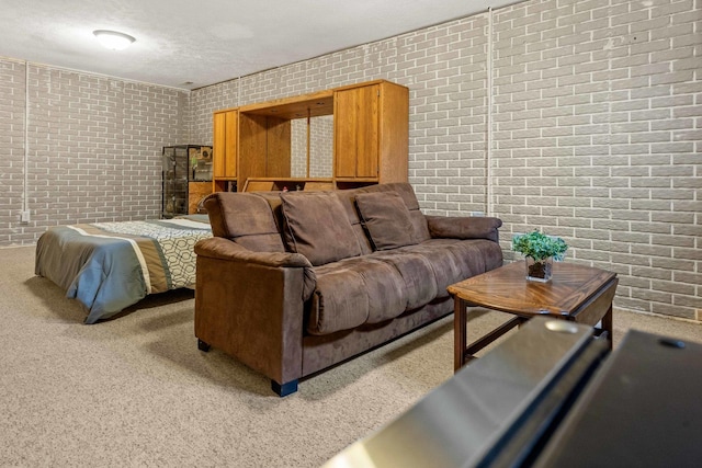 1201 Riviera Dr, Bloomington, IL 61701 - living area featuring brick wall and carpet flooring
