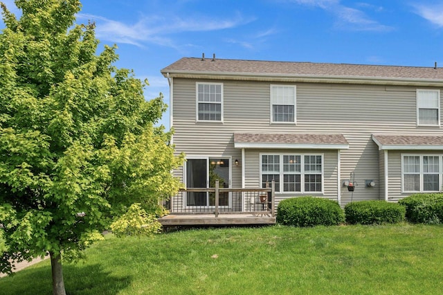 1201 Riviera Dr, Bloomington, IL 61701 - rear view of property featuring a wooden deck, a lawn, and a shingled roof
