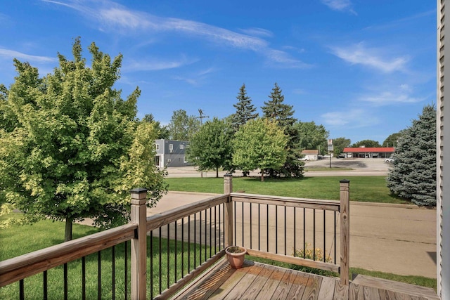 1201 Riviera Dr, Bloomington, IL 61701 - wooden deck featuring a lawn