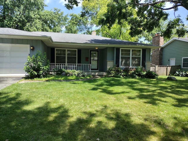 1544 Towhee Ln, Naperville, IL 60565 - single story home with board and batten siding, a garage, a porch, a front yard, and brick siding