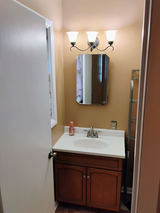 1544 Towhee Ln, Naperville, IL 60565 - bathroom featuring vanity and a chandelier