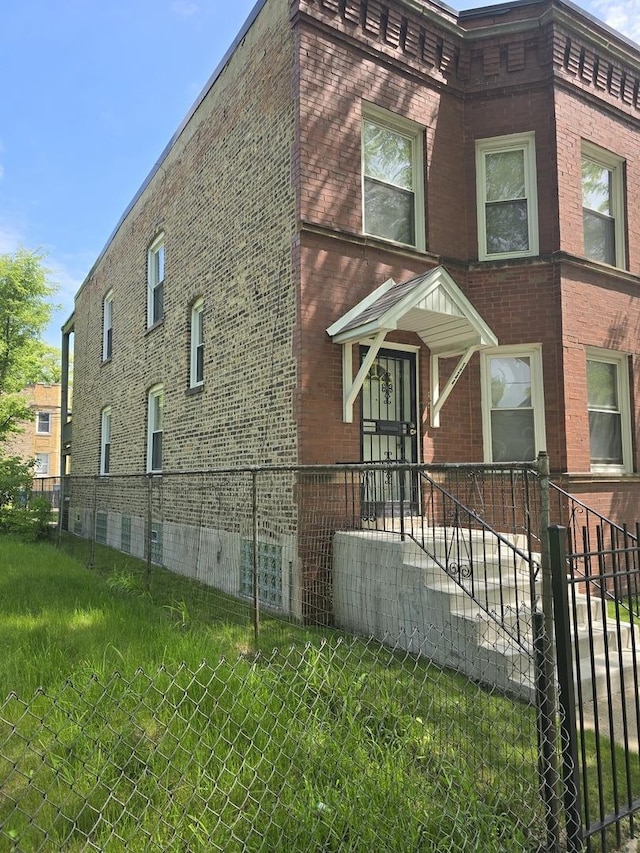 1244 E 70th St, Chicago, IL 60637 - view of front of property featuring brick siding