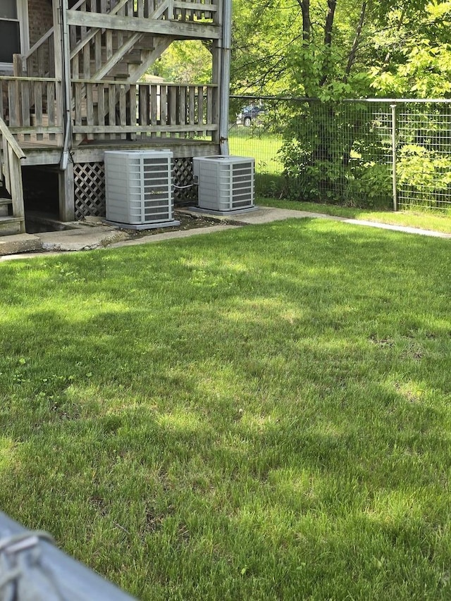 1244 E 70th St, Chicago, IL 60637 - view of yard with stairs and a wooden deck