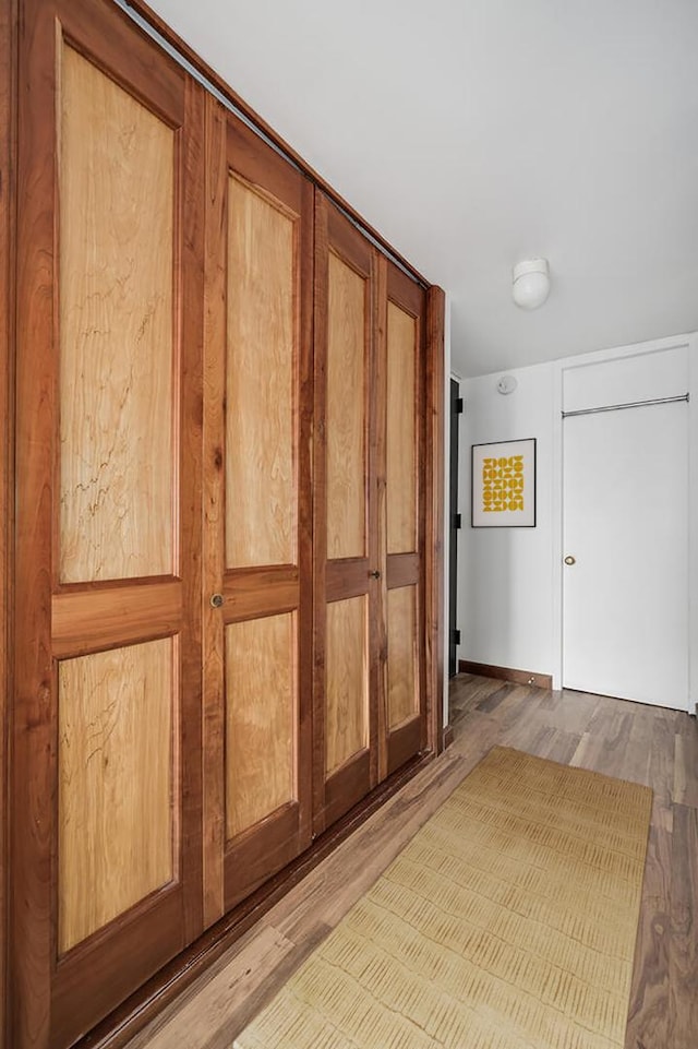 1030 N State St Unit 9G, Chicago, IL 60610 - hallway featuring wood finished floors and baseboards