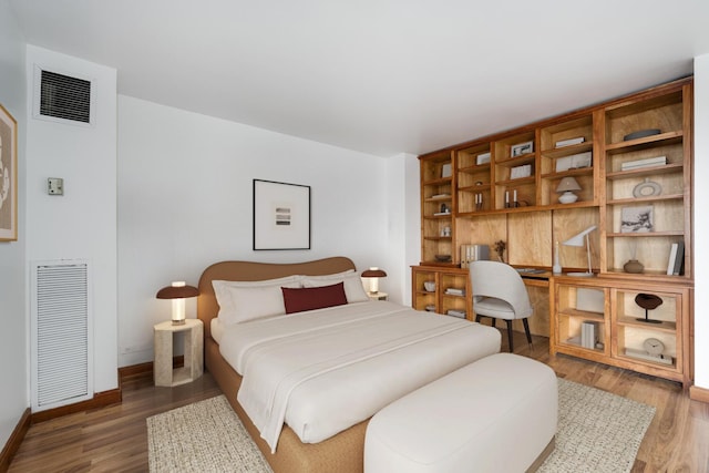 1030 N State St Unit 9G, Chicago, IL 60610 - bedroom featuring light wood-style floors and built in study area