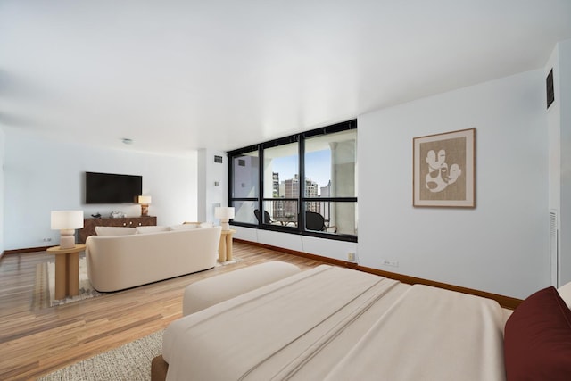 1030 N State St Unit 9G, Chicago, IL 60610 - bedroom with wood finished floors and baseboards