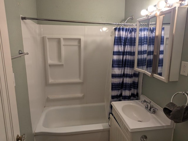 707 E Van Allen St, Tuscola, IL 61953 - bathroom featuring vanity and shower / bath combo