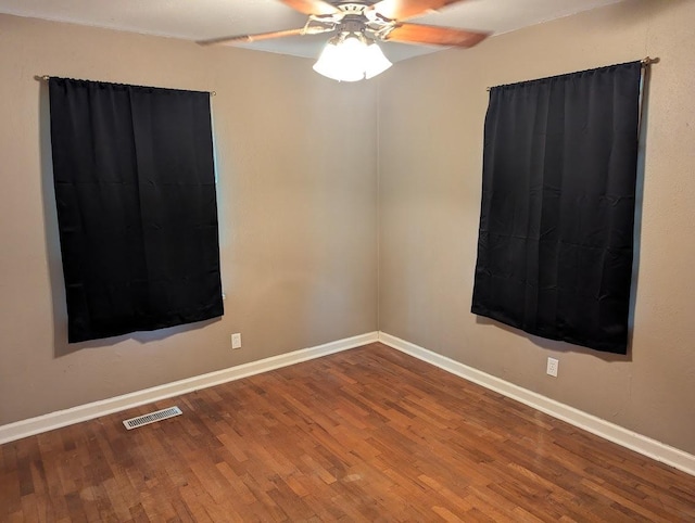 707 E Van Allen St, Tuscola, IL 61953 - spare room with wood finished floors and ceiling fan