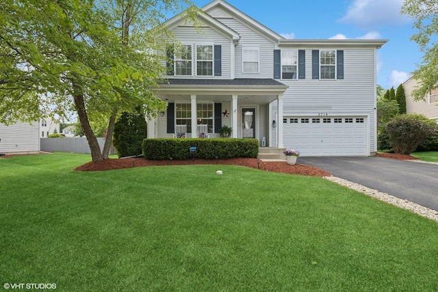 2714 Arbor Dr, Mchenry, IL 60050 - traditional home with driveway, an attached garage, and covered porch