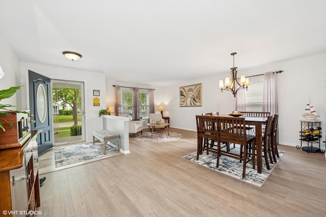 2714 Arbor Dr, Mchenry, IL 60050 - dining area featuring a chandelier and wood finished floors