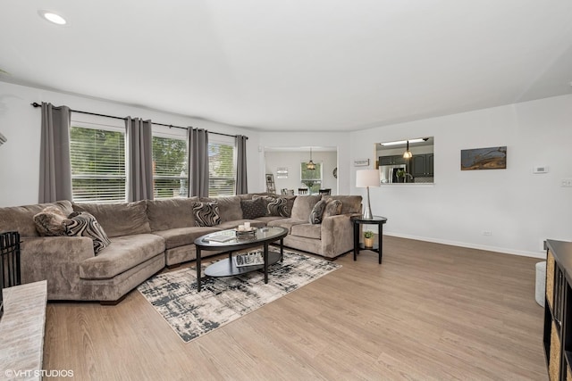 2714 Arbor Dr, Mchenry, IL 60050 - living room featuring light wood-type flooring and baseboards