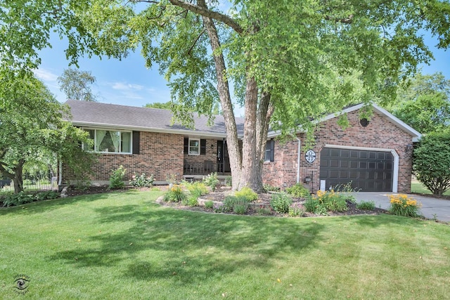 235 Fox Trail Ct, Bourbonnais, IL 60914 - single story home featuring brick siding, driveway, an attached garage, and a front yard