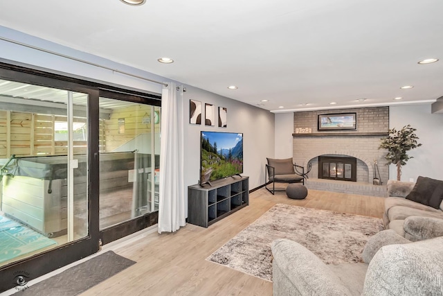 235 Fox Trail Ct, Bourbonnais, IL 60914 - living room featuring a fireplace, wood finished floors, and recessed lighting