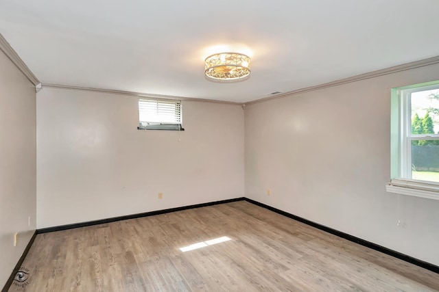 235 Fox Trail Ct, Bourbonnais, IL 60914 - unfurnished room with crown molding and light wood-style floors