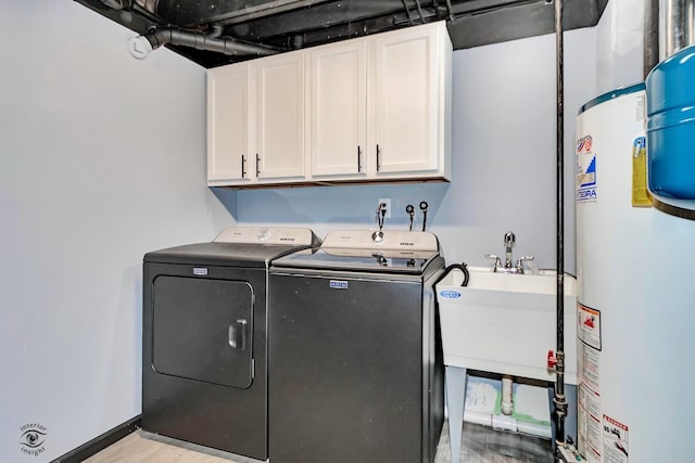 235 Fox Trail Ct, Bourbonnais, IL 60914 - laundry area with washing machine and clothes dryer, cabinet space, and gas water heater