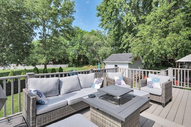 235 Fox Trail Ct, Bourbonnais, IL 60914 - wooden deck featuring an outdoor hangout area, view of wooded area, a lawn, and a shed