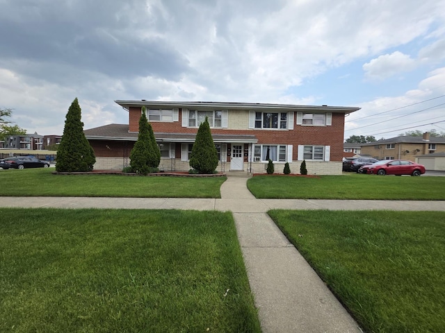 3641 W 120th St, Alsip, IL 60803 - view of front facade featuring brick siding and a front lawn