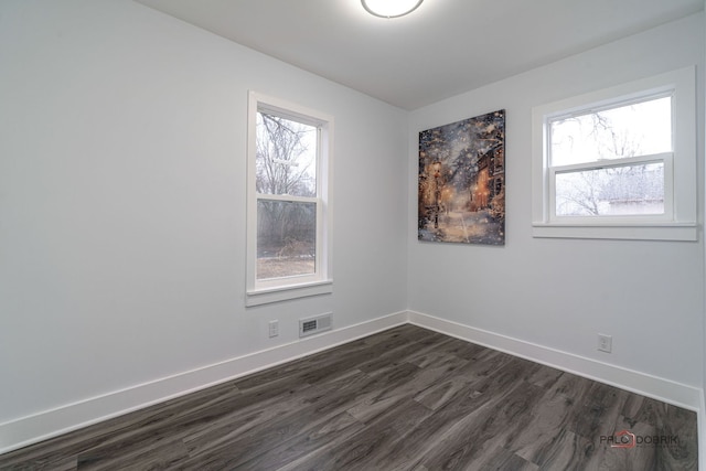 38236 N Lee Ave, Spring Grove, IL 60081 - unfurnished room featuring baseboards and dark wood-style floors