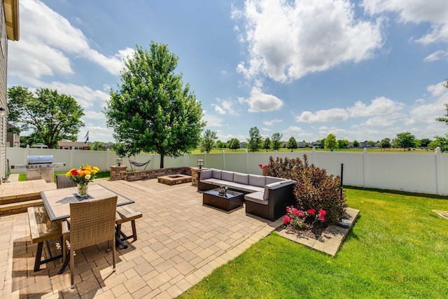 202 Dallas Dr, Bartlett, IL 60103 - fenced backyard with an outdoor living space with a fire pit, a patio area, area for grilling, and outdoor dining area