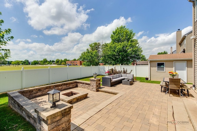 202 Dallas Dr, Bartlett, IL 60103 - fenced backyard featuring a patio area, an outdoor living space with a fire pit, and outdoor dining space