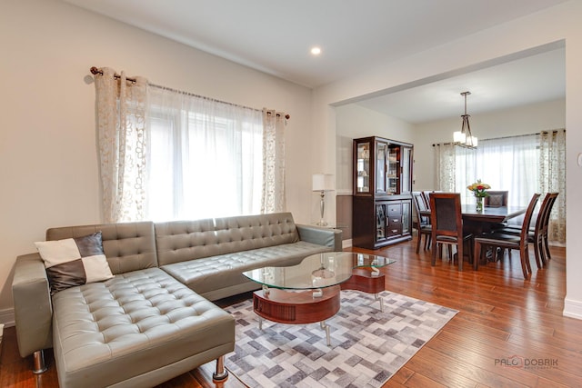 202 Dallas Dr, Bartlett, IL 60103 - living room featuring a chandelier, wood-type flooring, and recessed lighting