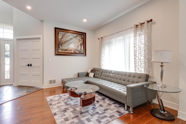 202 Dallas Dr, Bartlett, IL 60103 - living area with plenty of natural light, wood-type flooring, and recessed lighting