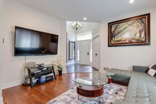 202 Dallas Dr, Bartlett, IL 60103 - living area with a chandelier, wood finished floors, and recessed lighting