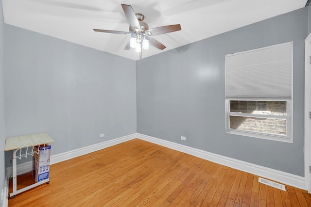 7505 S May St, Chicago, IL 60620 - unfurnished room with hardwood / wood-style flooring and a ceiling fan