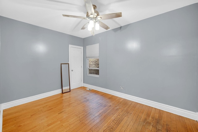 7505 S May St, Chicago, IL 60620 - spare room with light wood-style flooring and ceiling fan