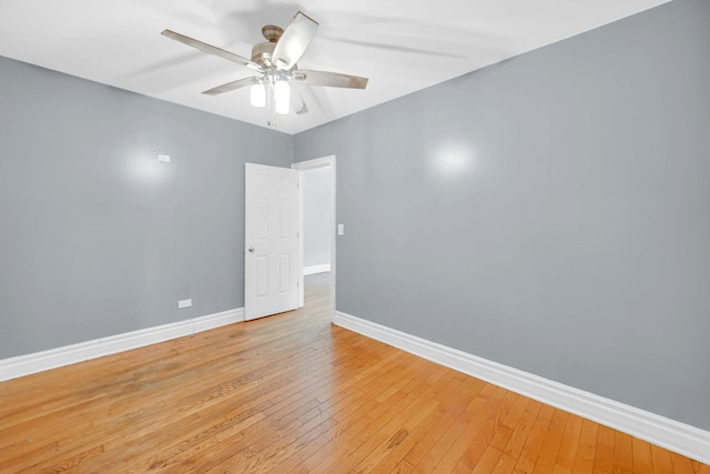 7505 S May St, Chicago, IL 60620 - empty room featuring light wood-style flooring and a ceiling fan
