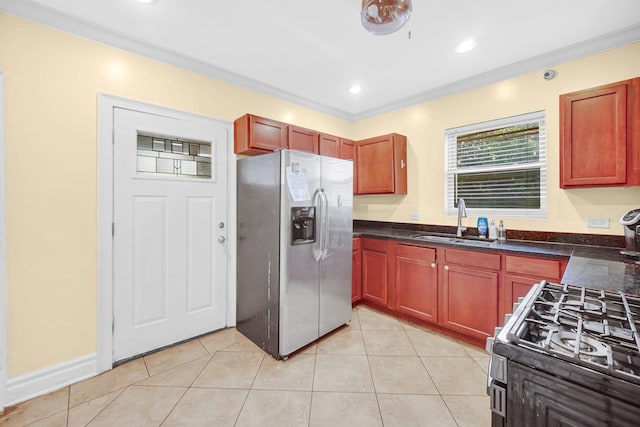 7505 S May St, Chicago, IL 60620 - kitchen with stainless steel appliances, light tile patterned floors, dark stone countertops, and recessed lighting