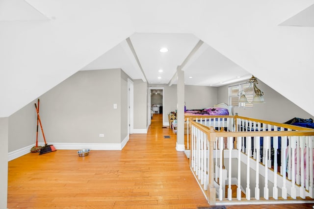 7505 S May St, Chicago, IL 60620 - hallway with light wood-style floors, recessed lighting, and an upstairs landing
