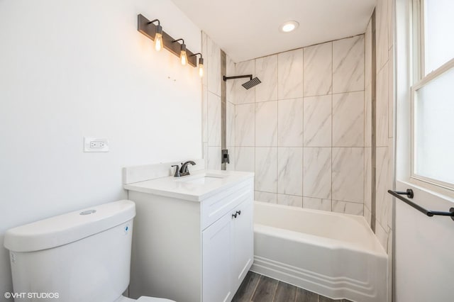 3818 W 107th St, Chicago, IL 60655 - full bathroom with vanity, wood finished floors, washtub / shower combination, and recessed lighting