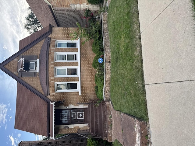 10212 S Prairie Ave, Chicago, IL 60628 - view of front of house with cooling unit and brick siding