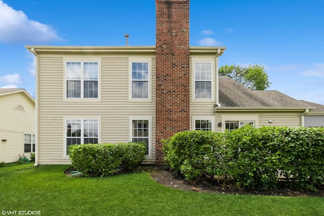 36230 N Old Creek Ct, Gurnee, IL 60031 - rear view of property featuring a chimney and a yard