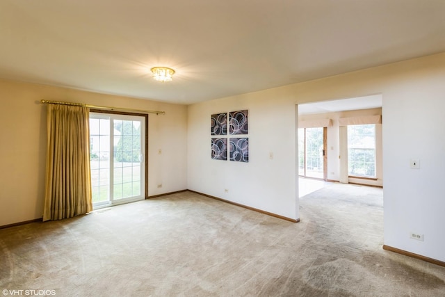 36230 N Old Creek Ct, Gurnee, IL 60031 - spare room with plenty of natural light and carpet