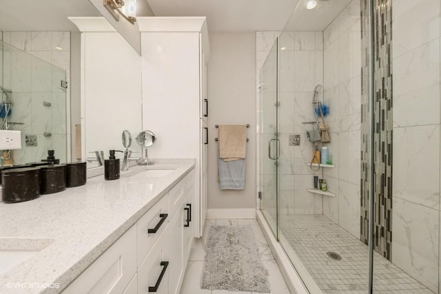 4730 S Champlain Ave Unit 3, Chicago, IL 60615 - bathroom with double vanity and a stall shower