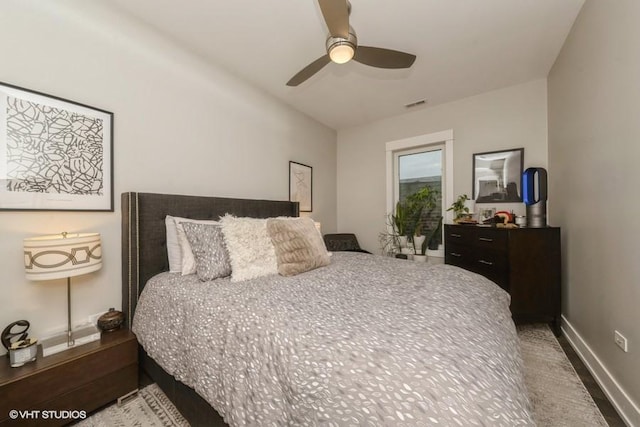 4730 S Champlain Ave Unit 3, Chicago, IL 60615 - bedroom featuring baseboards and a ceiling fan