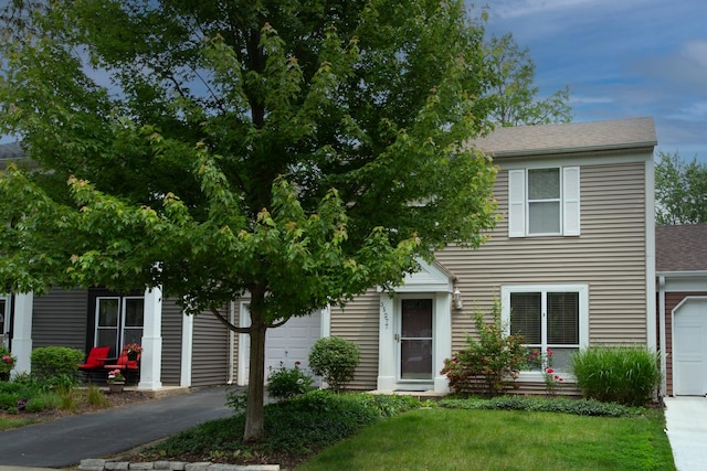 3S277 Birchwood Dr, Warrenville, IL 60555 - view of front of home with a front yard, roof with shingles, and driveway