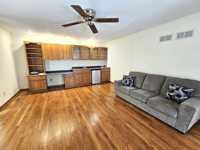 9616 Zimmer Dr, Algonquin, IL 60102 - living room with light wood finished floors, wet bar, and a ceiling fan