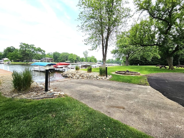 9616 Zimmer Dr, Algonquin, IL 60102 - view of patio / terrace with a dock and a water view